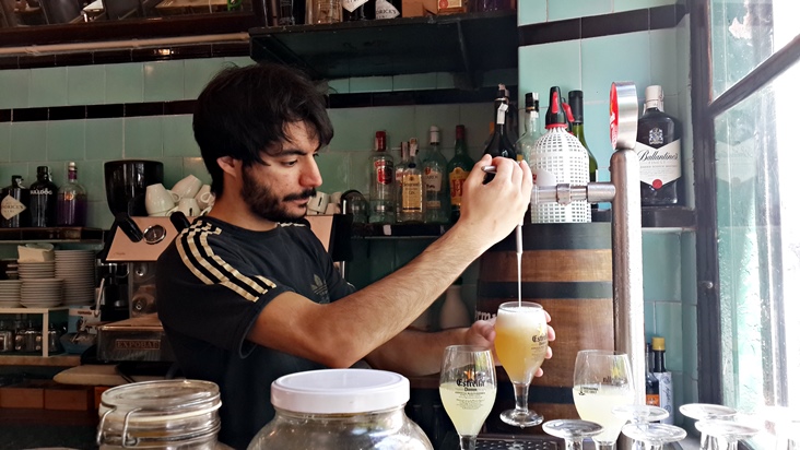 Diego preparing clara at El Sortidor during Barcelona Eat Local Food Tour