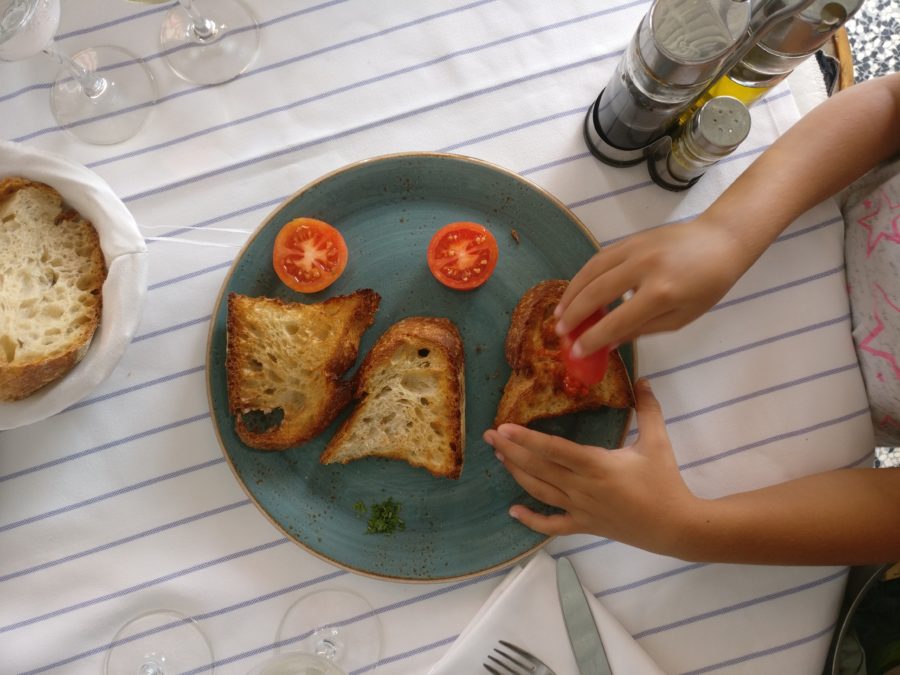 preparing bread with tomato