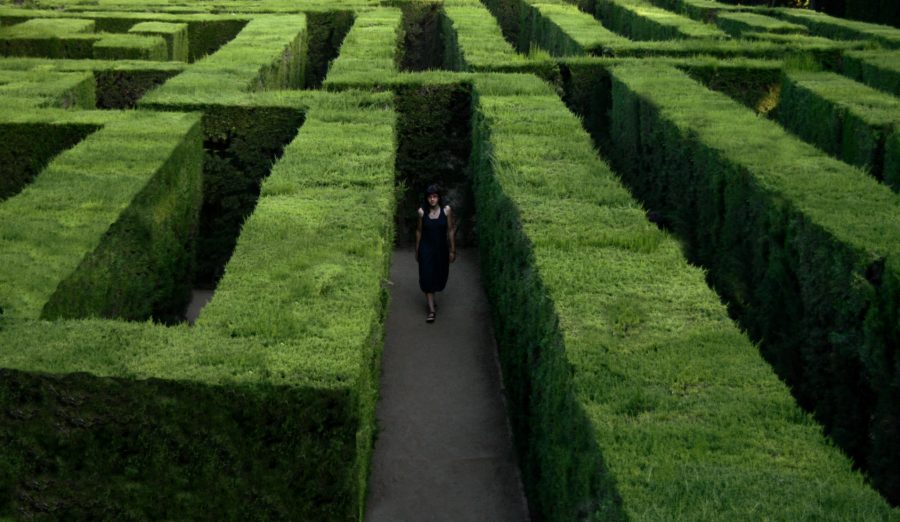 Woman walking at labyrinth Horta